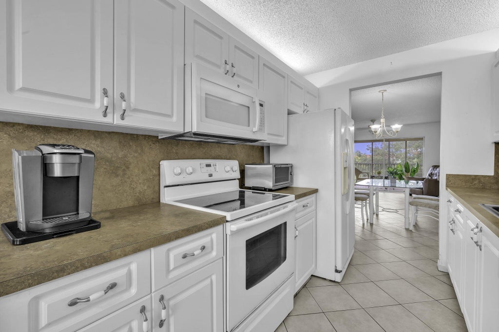Photo of 13001 SW 15th Court #404t, Pembroke Pines, FL 33027 (MLS # B26048065)