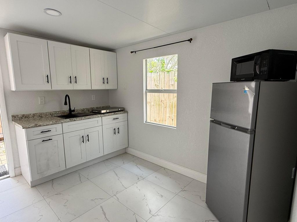 Photo of 4904 Dillon Street #C, Greenacres, FL 33463 (MLS # B26027840)