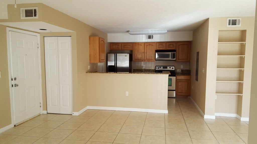 Photo of 261 SW Palm Drive #105, Saint Lucie West, FL 34986 (MLS # R10929946)