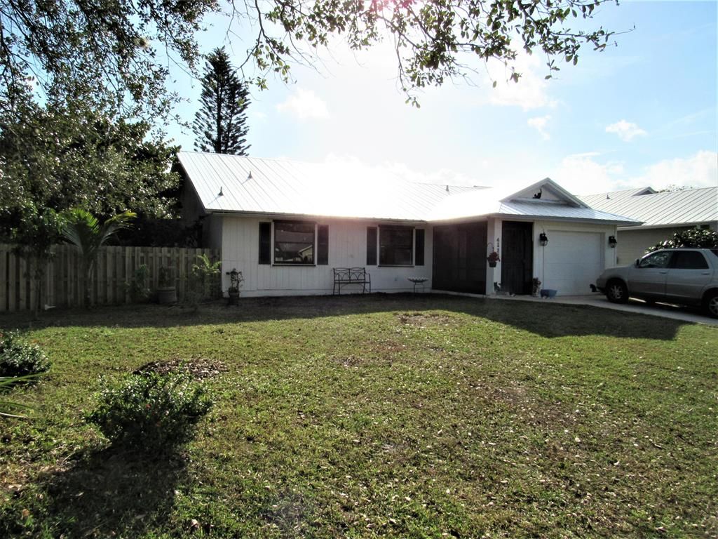 Photo of 4232 SE Jacaranda Street, Stuart, FL 34997 (MLS # R10692695)