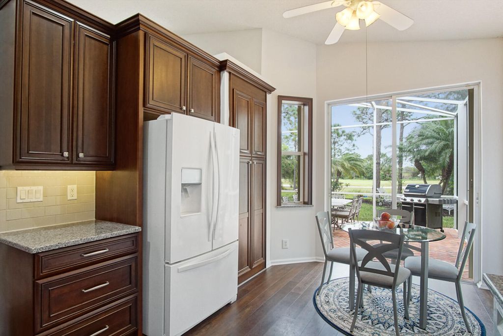 Photo of 908 NW Mossy Oak Way, Jensen Beach, FL 34957 (MLS # R10970100)