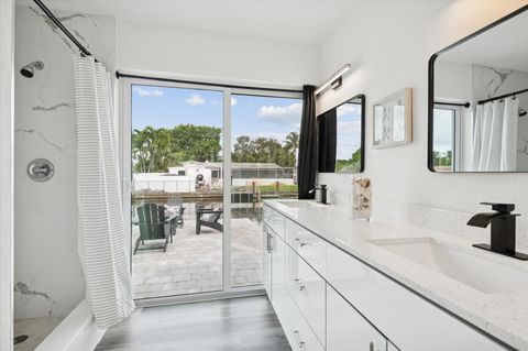 Tiny photo for 1921 NW 31st Court, Oakland Park, FL 33309 (MLS # F10555255)