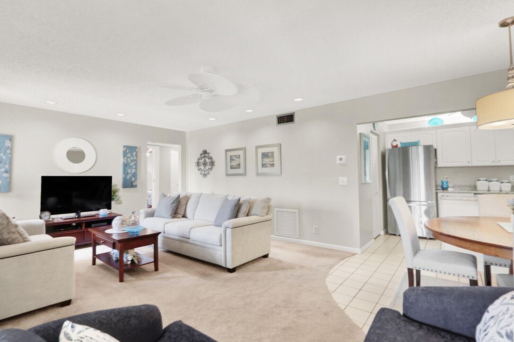 Photo of 323 Knotty Pine Circle #A2, Greenacres, FL 33463 (MLS # B26005428)