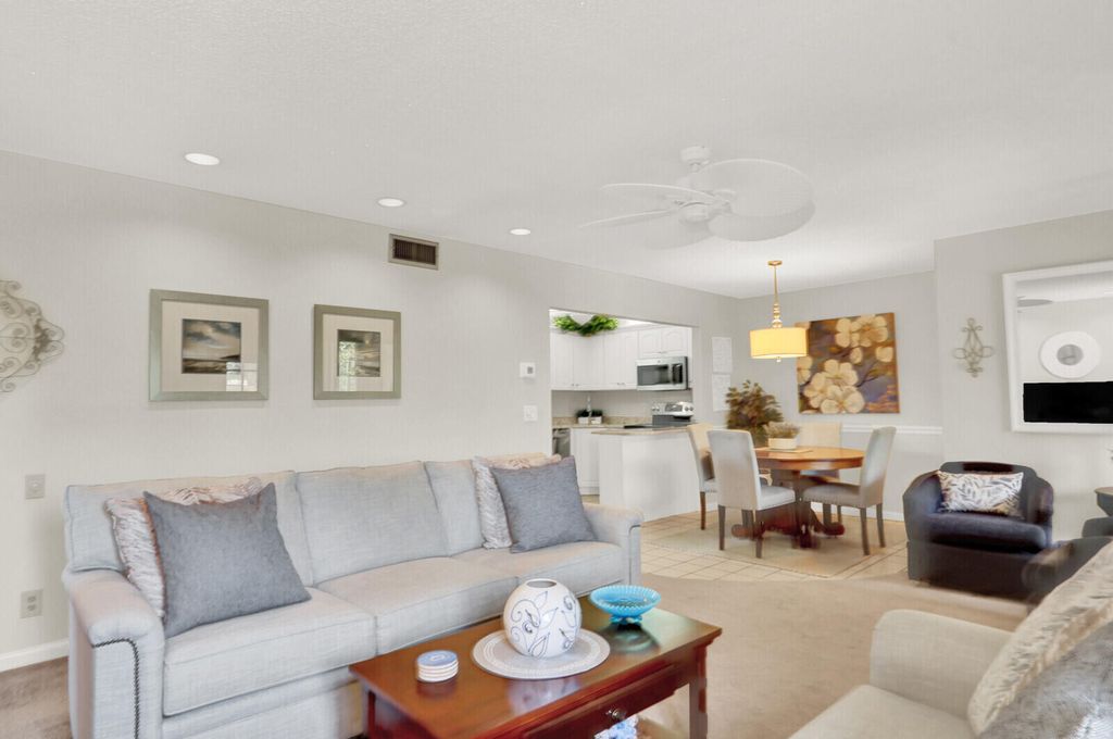 Photo of 323 Knotty Pine Circle #A2, Greenacres, FL 33463 (MLS # B26005428)