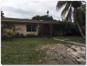 DUPLEX, LOCATED ON DEAD END STREET, GREAT INVESTMENT OPPORTUNITY, PLEASE VIEW PROPERTY PRIOR TO OFFERS. Per PBC code, detached unit is not a legal unit. Sold as is.