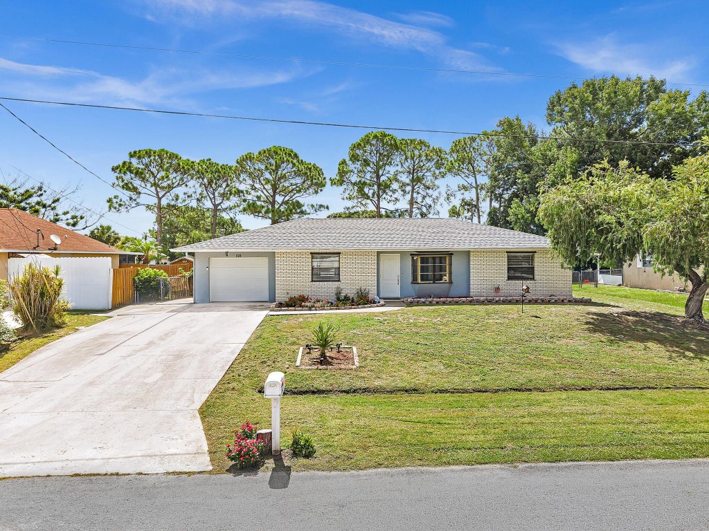 Photo of 515 NW Twylite Terrace, Port Saint Lucie, FL 34983 (MLS # B26063691)