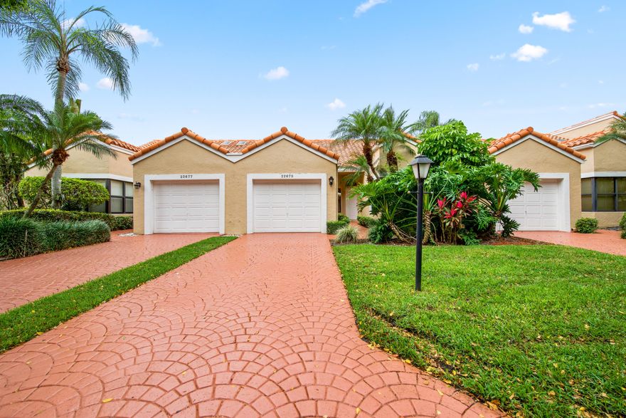 Welcome to Meridiana in desirable Boca Pointe. Boca Pointe itself offers optional membership perfect for those who want to live in a golf country club without the high dues and fees associated with joining. This area offers proximity to A+ schools, a variety of local amenities, dining, shopping, and leisure activities. This beautifully maintained villa offers a perfect blend of comfort and style, featuring 1,528 square feet of well-designed living space. As you step inside, you are greeted by vaulted ceilings, porcelain tile and an open and inviting layout that seamlessly connects the main living areas. The spacious living room is ideal for relaxing or entertaining, with ample natural light pouring in through large windows, creating a warm and welcoming atmosphere.