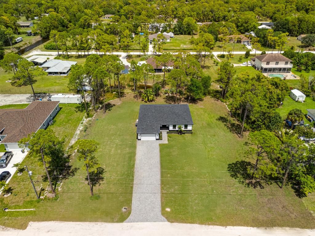 Photo of 15591 79 Court N, The Acreage, FL 33470 (MLS # R11126278)