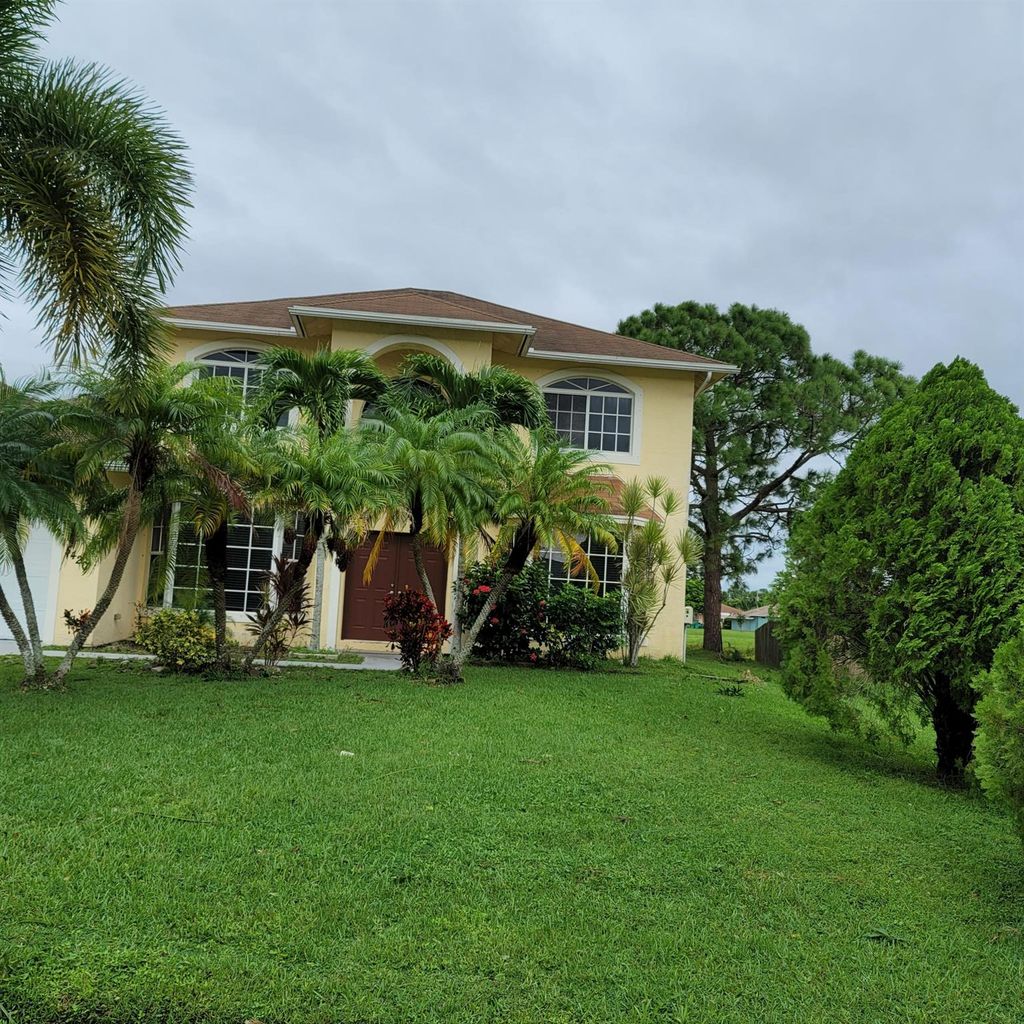 Photo of 5420 NW Emblem Street, Port Saint Lucie, FL 34983 (MLS # R11028541)