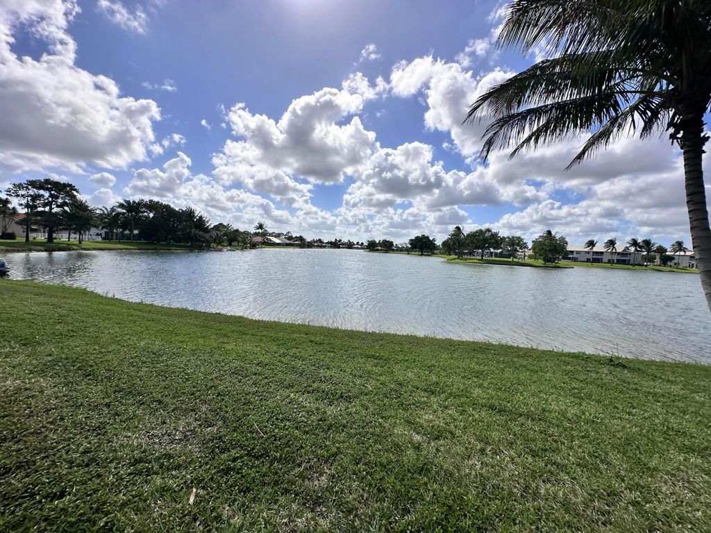 Photo of 6695 Lake Loran Way, Greenacres, FL 33467 (MLS # B26014497)