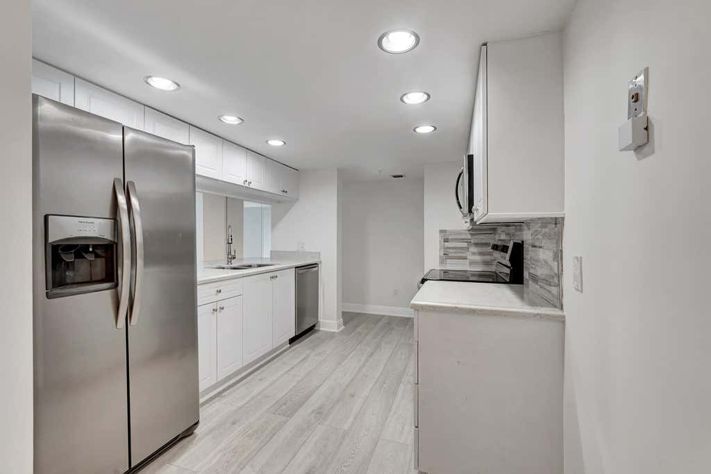 Photo of 2025 Lavers Circle #D-504, Delray Beach, FL 33444 (MLS # R10806161)