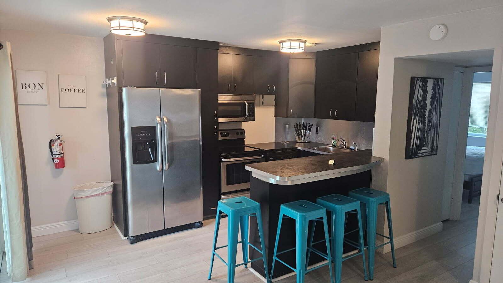 Fully furnished turnkey 2/1.5 unit on second floor of a two story building. Newly decorated and ready to move in with just your personal belongings. The unit is directly on the intracoastal and has an outdoor seating area for relaxing and is minutes from the ocean, dining, shopping, downtown Palm Beach and PBI.