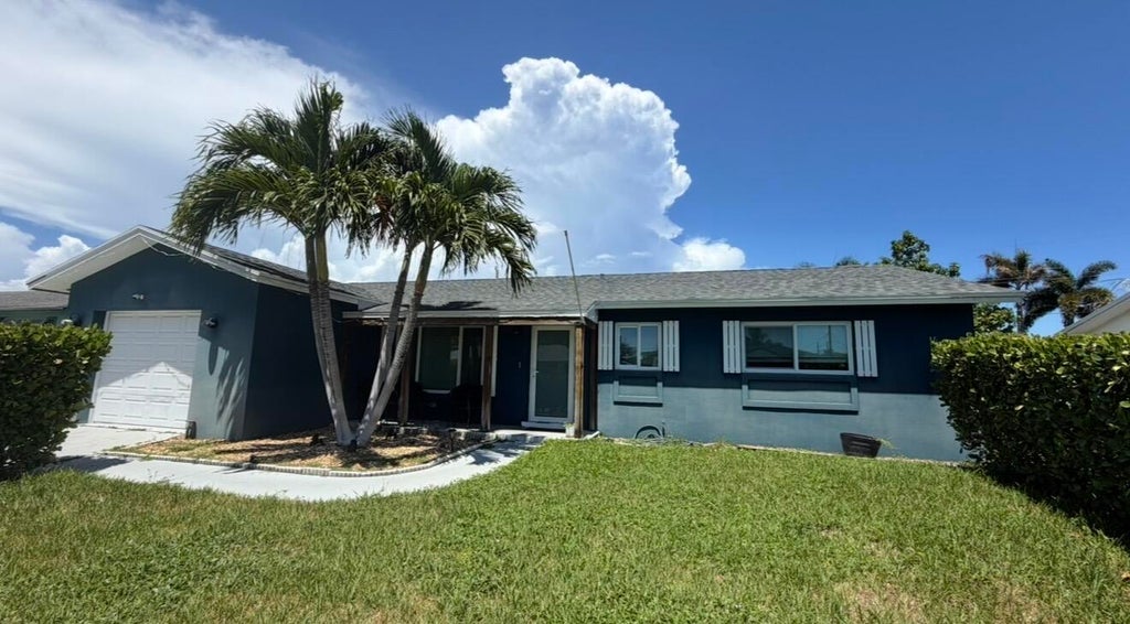Photo of 1023 SW 25TH Place, Boynton Beach, FL 33426 (MLS # B26069676)