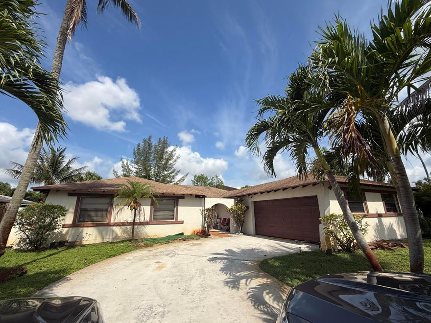 Great opportunity to make this home your own! Located in a convenient West Palm Beach neighborhood with easy access to I-95, Florida's Turnpike, shopping, dining, and schools. This property offers a spacious layout and plenty of potential for buyers looking to add their personal touch. Home needs TLC but has great bones and endless possibilities. Perfect for homeowners or investors alike. Sellers are very motivated and ready to make a deal don't miss this opportunity!