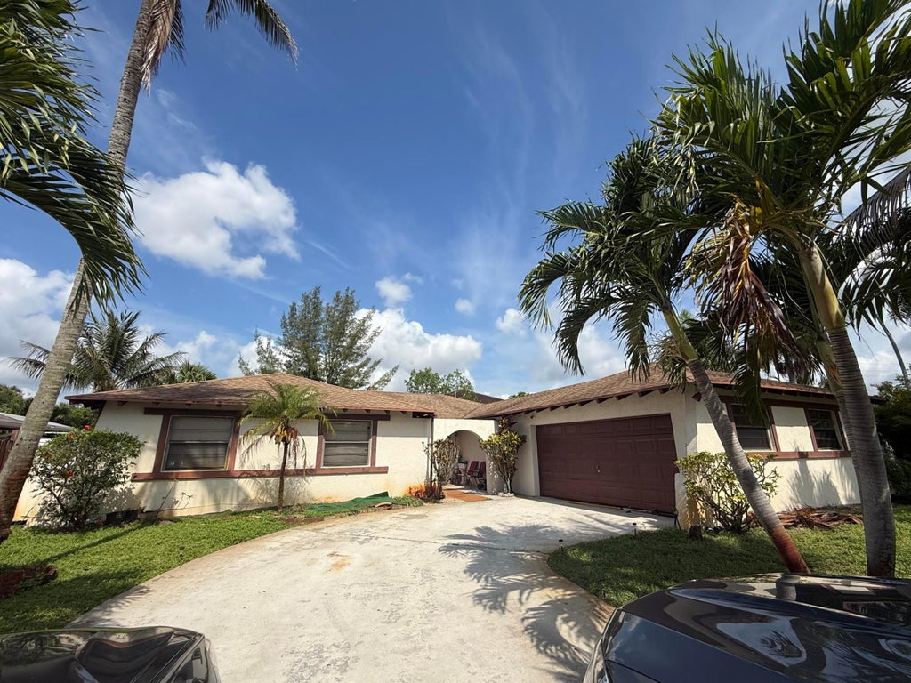 Photo of 915 Ryanwood Drive, West Palm Beach, FL 33413 (MLS # B26027789)