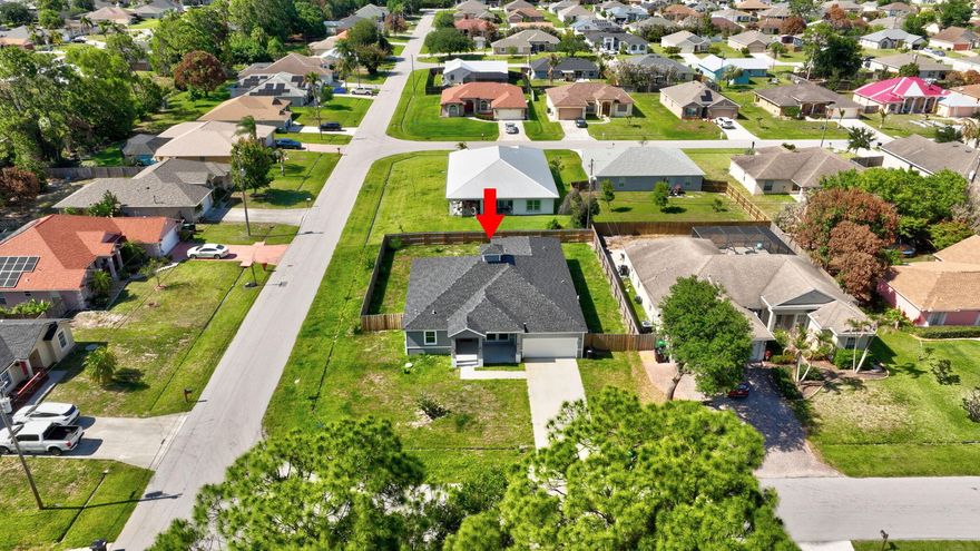 Why wait to build? Move into this 2024 construction in Port St. Lucie only lived in for 1 year- This 4 bed, 3 bath 2 car-garage home comes with impact windows and offers 2,239 sq ft of modern living in a non-HOA neighborhood. Sleek cabinetry, generous counter space, and a bright open layout designed for everyday comfort. A new washer and dryer (March 2025) adds extra convenience.       Theres more! A NEWLY INSTALLED FENCE for ultimate privacy.      Located in fast-growing Port St. Lucie, known for its parks, shopping, and easy access to beaches and highways, this home blends style, space, and location perfectly.