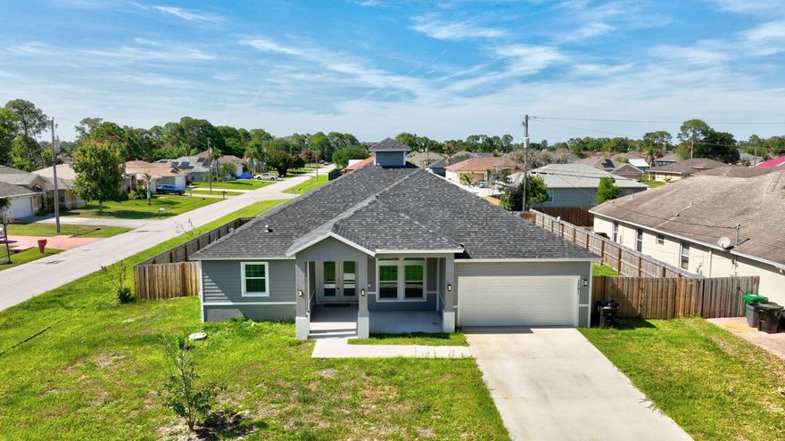 Why wait to build? Move into this 2024 construction in Port St. Lucie only lived in for 1 year- This 4 bed, 3 bath 2 car-garage home comes with impact windows and offers 2,239 sq ft of modern living in a non-HOA neighborhood. Sleek cabinetry, generous counter space, and a bright open layout designed for everyday comfort. A new washer and dryer (March 2025) adds extra convenience.       Theres more! A NEWLY INSTALLED FENCE for ultimate privacy.    Located in fast-growing Port St. Lucie, known for its parks, shopping, and easy access to beaches and highways, this home blends style, space, and location perfectly.