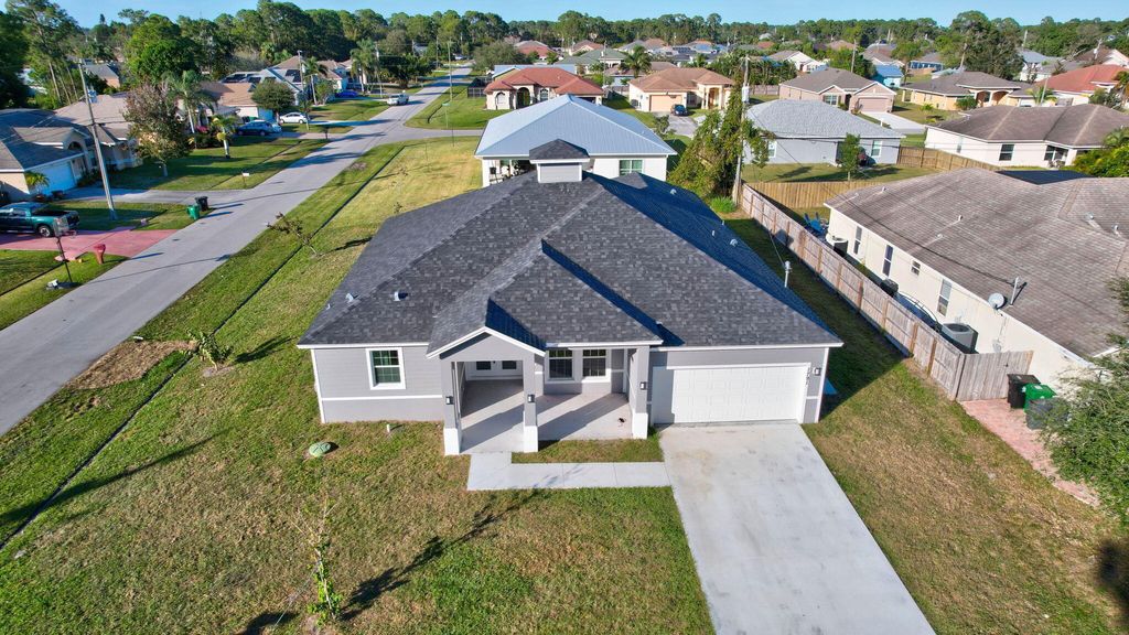 Photo of 1791 SW Effland Avenue, Port Saint Lucie, FL 34953 (MLS # R11161768)