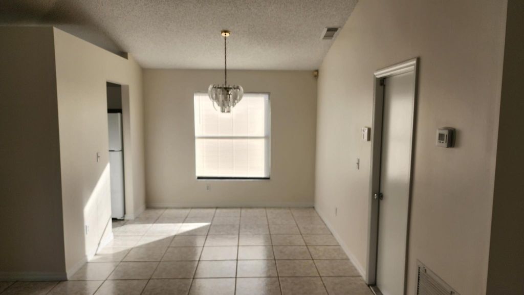 Photo of 648 SW Nichols Terrace, Port Saint Lucie, FL 34953 (MLS # R11099287)