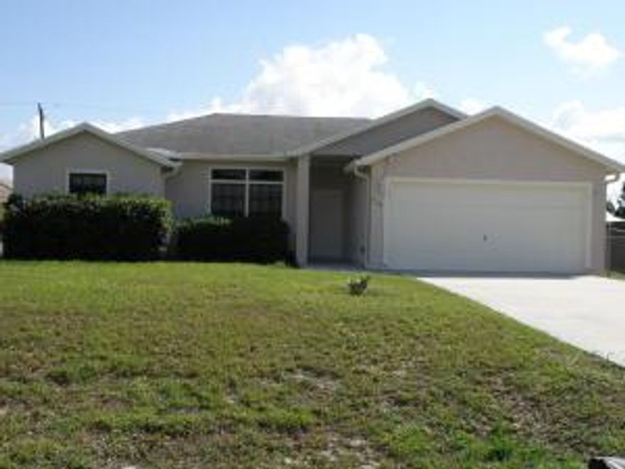 Cozy 3 BR 2 BA 2 CG rental in western PSL. Tile throughout living areas, wood laminate in bedrooms. Private  fenced backyard, screened porch.  Great location with easy access to Florida turnpike. First, Last and Security is required. No Pets. Available now.
