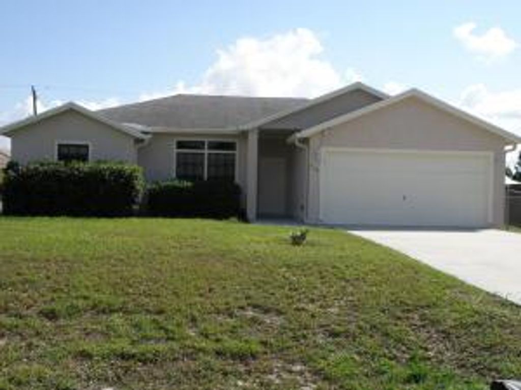 Photo of 648 SW Nichols Terrace, Port Saint Lucie, FL 34953 (MLS # R11099287)
