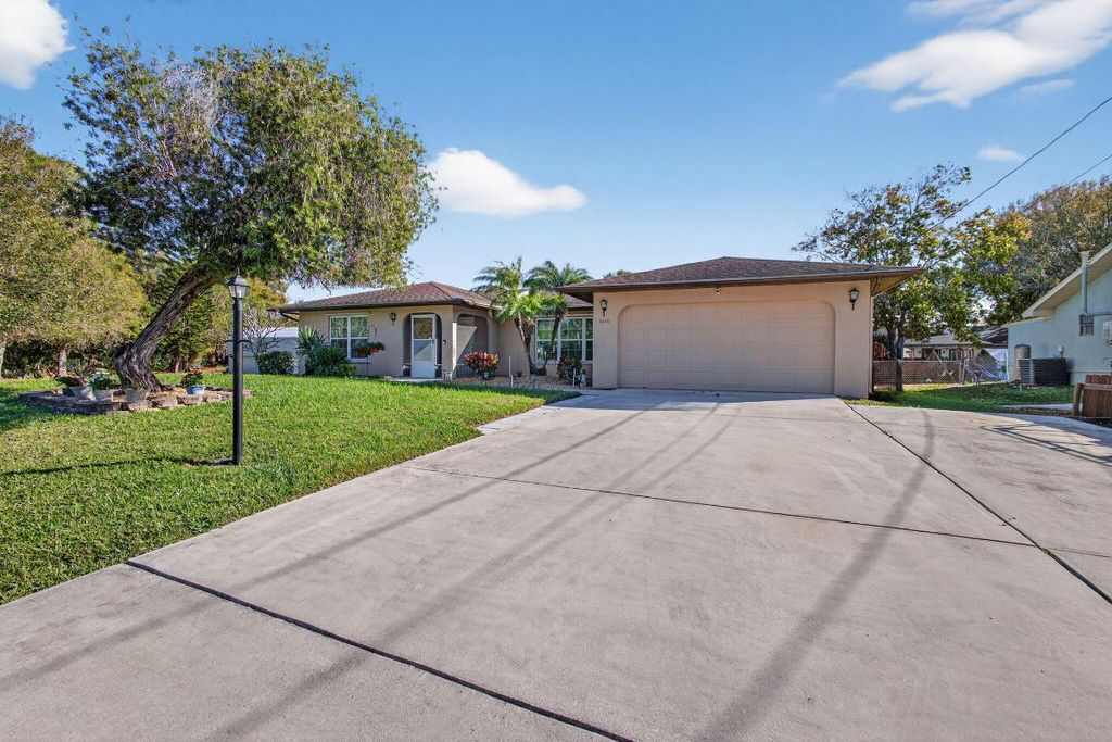 Photo of 5216 Palm Drive, Fort Pierce, FL 34982 (MLS # R11150565)