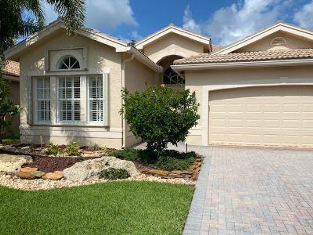 Photo of 7571 Cape Verde Lane Ln, Lake Worth Beach, FL 33467 (MLS # R10733710)