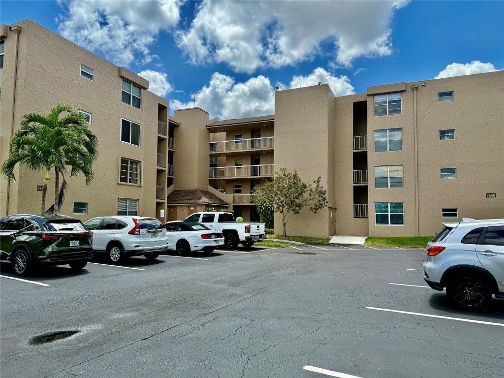 Photo of 9440 Tangerine Place #107, Davie, FL 33324 (MLS # F10497348)