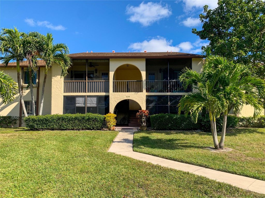 Photo of 330 Knotty Pine Circle #A1, Greenacres, FL 33463 (MLS # F10480958)