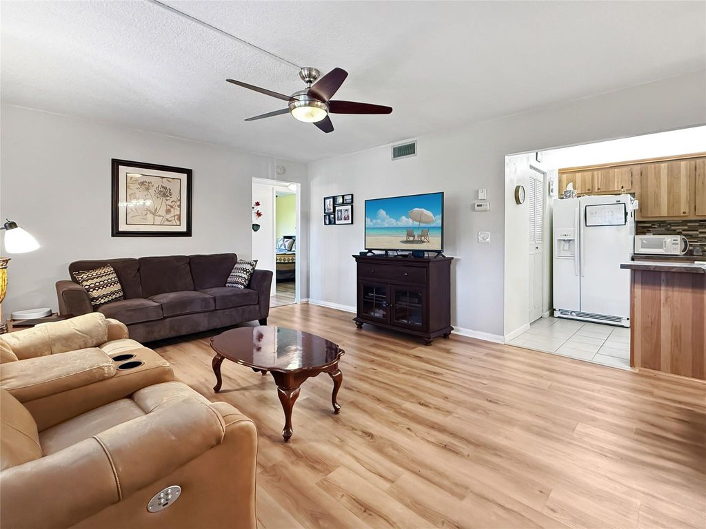 Photo of 330 Knotty Pine Circle #A1, Greenacres, FL 33463 (MLS # F10480958)