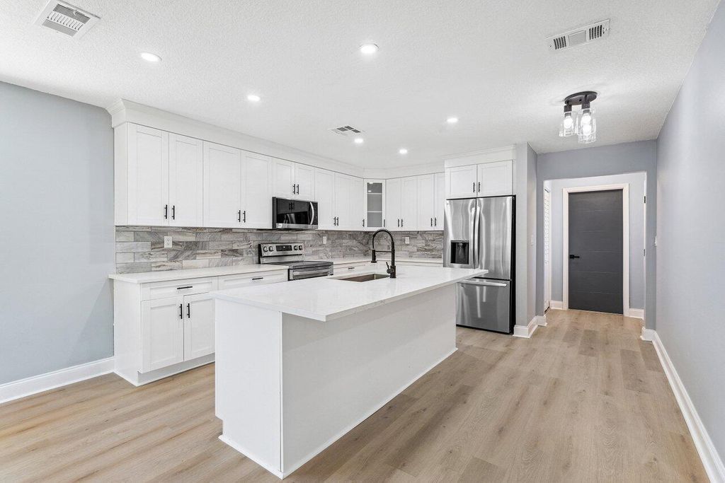 Photo of 739 Mallard Drive, Delray Beach, FL 33444 (MLS # R10963407)