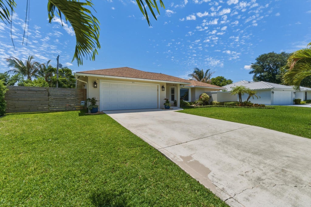 Photo of 371 Evergreen Avenue, Jupiter, FL 33469 (MLS # B26030341)