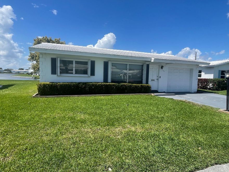 THIS 2BDRM/2BATH/1CG SINGLE FAMILY HOME ON THE WATER WITH SEAWALL & DAVITS IS IN A WONDERFUL 55+ COMMUNITY IN BOYNTON BEACH. CAN HAVE A BOAT THERE!!  THE HOME HAS BEEN REMODELED, WITH A BEAUTIFUL KITCHEN, STAINLESS STEEL APPLIANCES, QUARTZ COUNTERTOPS, TILE THROUGH OUT, 2 GOOD SIZE BEDROOMS, 1 BATHROOM WHICH IS ALSO UPGRADED, PLUS ENJOY YOUR 1 CAR GARAGE AND FLORIDA ROOM WHICH OVER LOOKS THE WATERWAY!!! PALM BEACH LEISUREVILLE ALSO OFFERS NUMEROUS AMENITIES WHICH INCLUDE PAR 3 GOLF COURSE, 3 POOLS, 3 CLUBHOUSES, DANCES, BINGO CRAFT SHOWS, FITNESS CENTER, CARPENTER SHOP, GAMES OF ALL KINDS, AND THE FLEE MARKET ON SATURDAYS DURING THE WINTER SEASON. ALL TENANTS DO HAVE TO BE APPROVED AND GO THRU ORIENTATION. OWNER WILL CONSIDER A SMALL PET WITH NON-REFUNDABLE PET DEPOSIT. LAWN CARE INCLUDED.