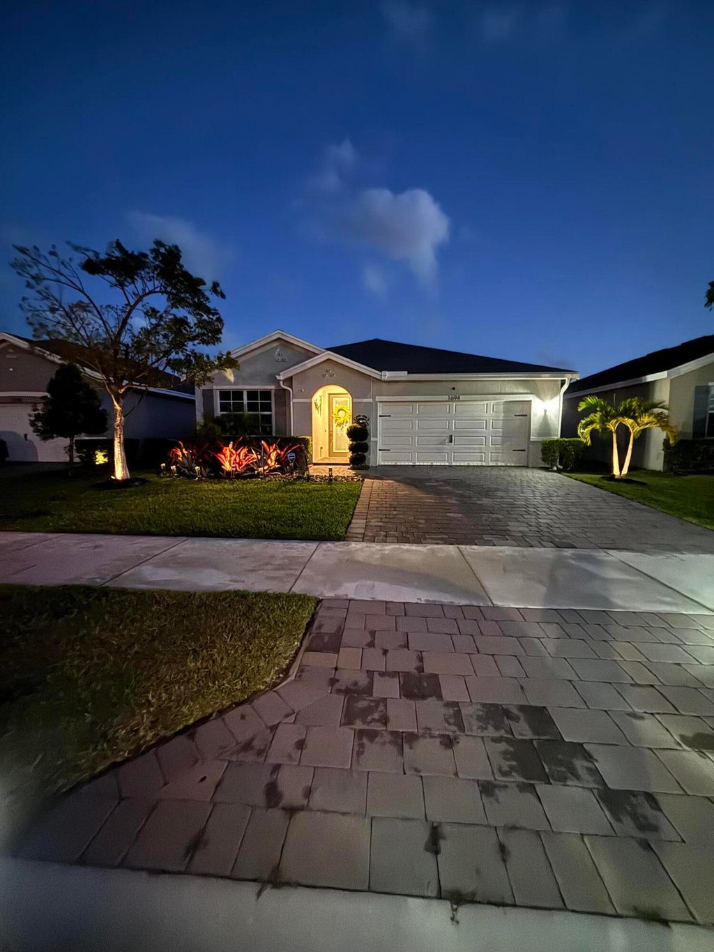 Photo of 1694 NE WHITE PINE Terrace, Ocean Breeze, FL 34957 (MLS # B26071223)