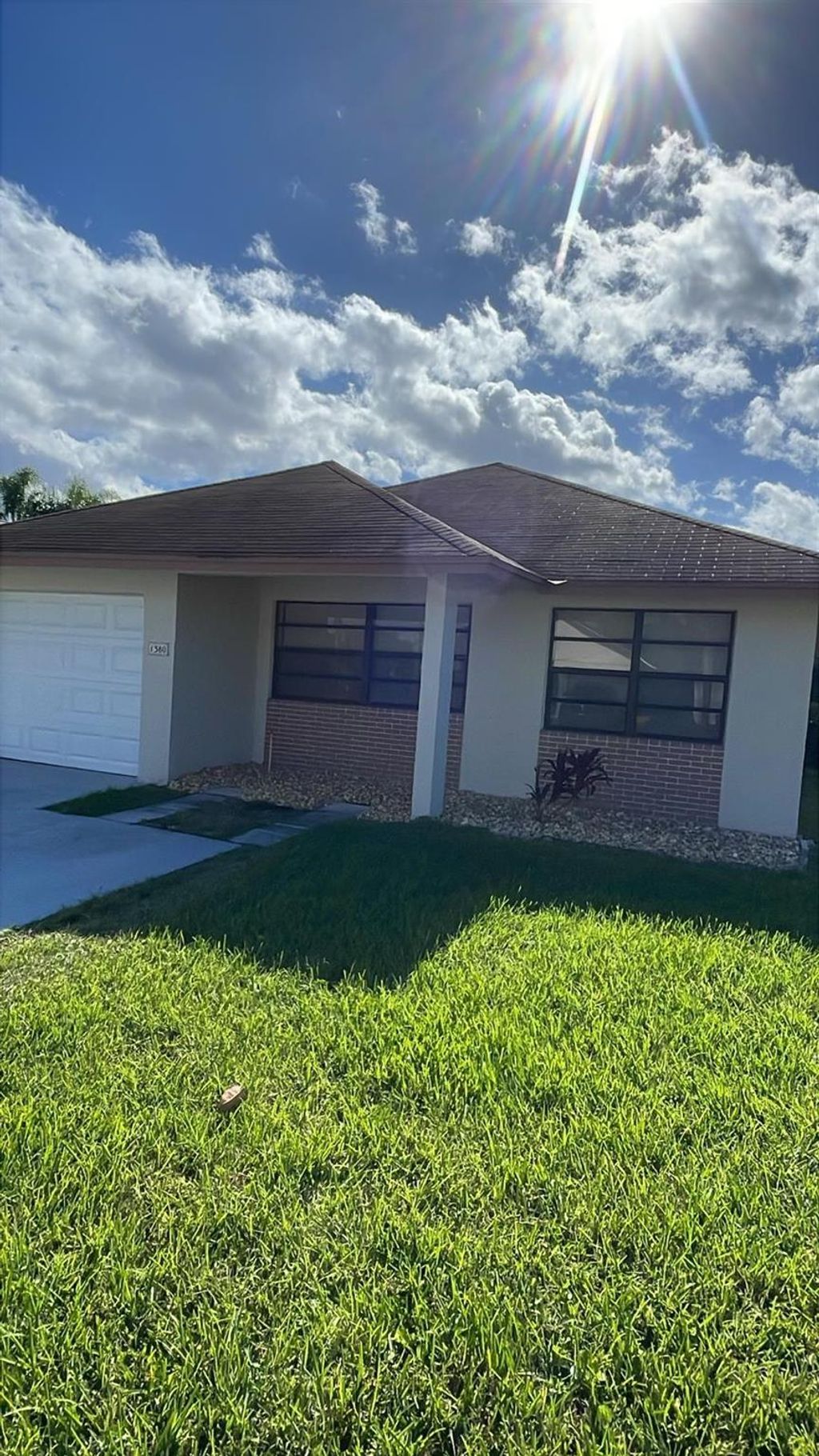 Photo of 1380 Longarzo Place, West Palm Beach, FL 33415 (MLS # R11127360)