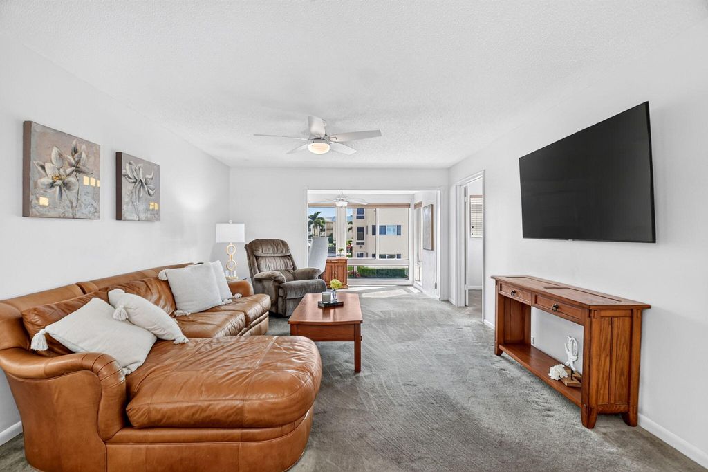 Photo of 25 Colonial Club Drive #205, Boynton Beach, FL 33435 (MLS # B26048269)