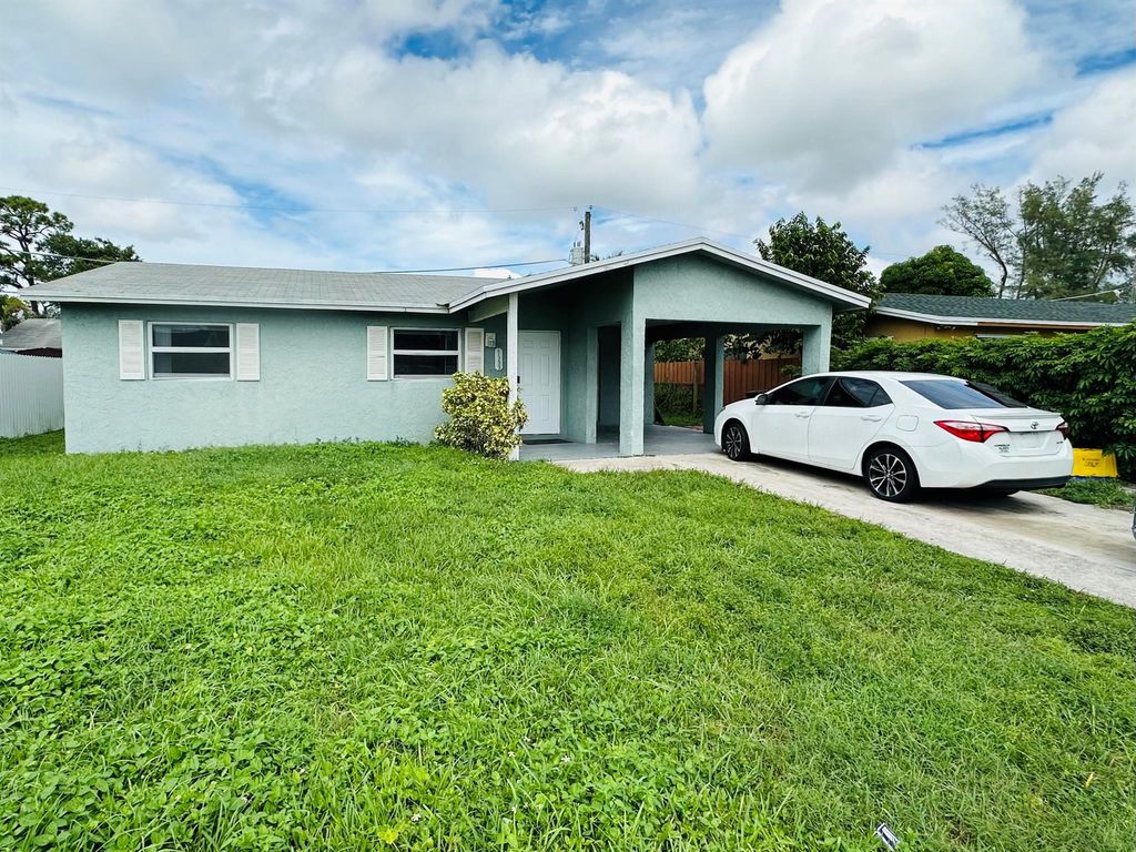 Photo of 4599 Pruden Boulevard, Lake Worth, FL 33463 (MLS # R11130961)