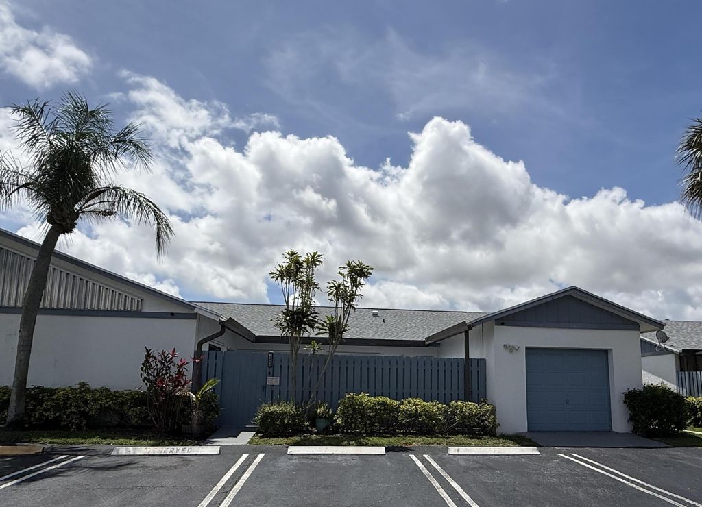 Photo of 1204 Timberlane Circle #12d, Greenacres, FL 33463 (MLS # B26024834)