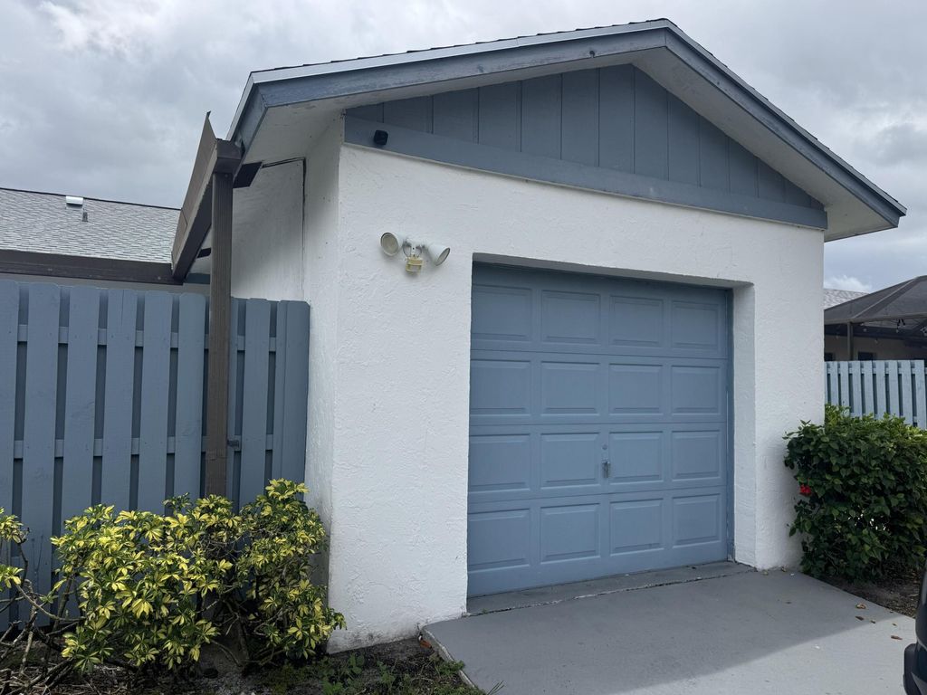 Photo of 1204 Timberlane Circle #12d, Greenacres, FL 33463 (MLS # B26024834)