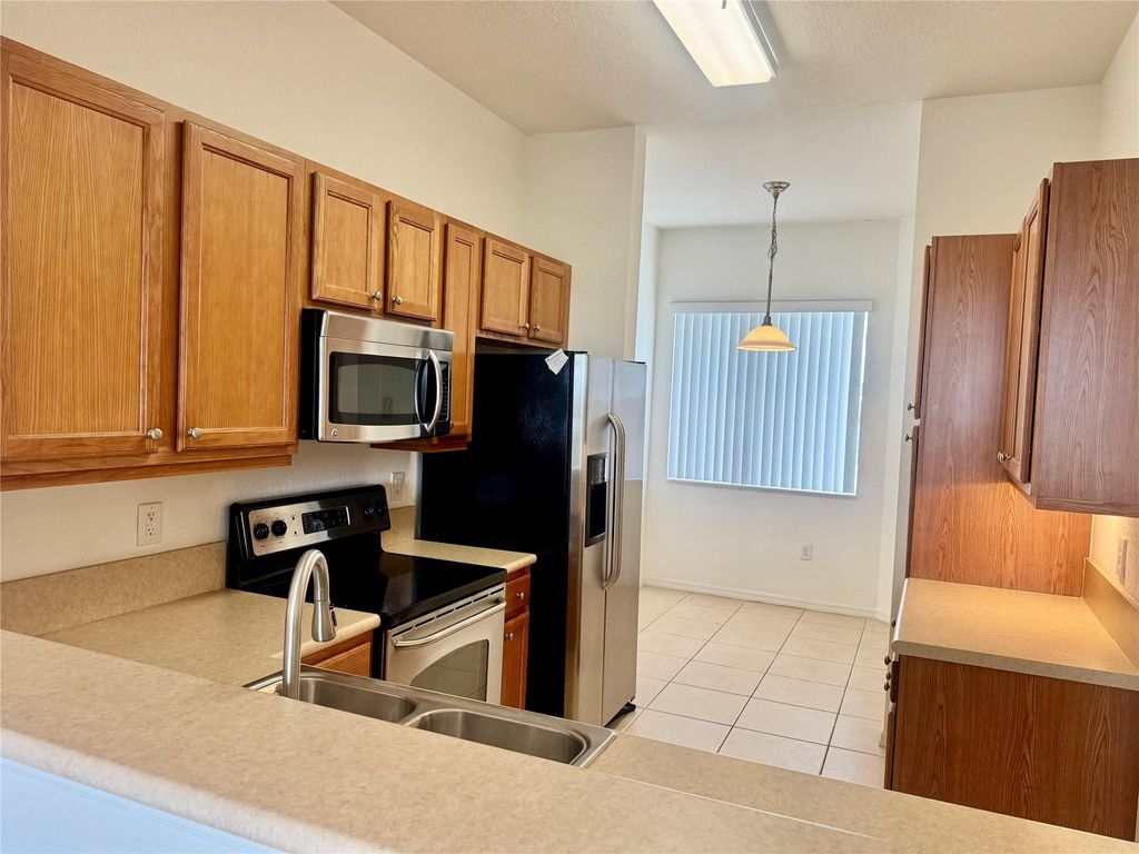 Photo of 3600 Oaks Clubhouse Drive #502, Pompano Beach, FL 33069 (MLS # F10555940)