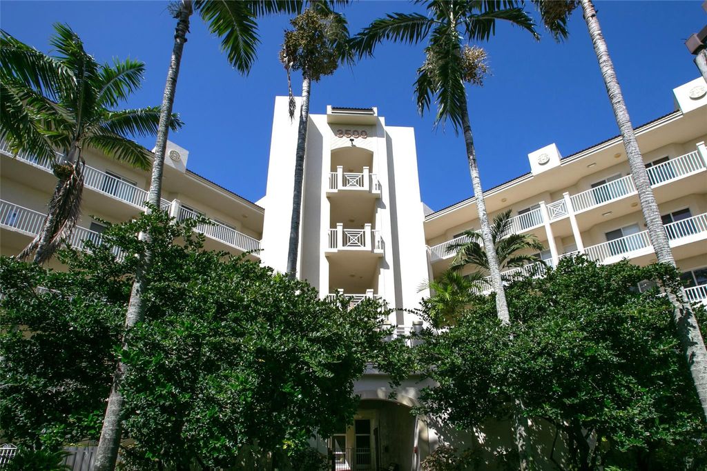 Photo of 3600 Oaks Clubhouse Drive #502, Pompano Beach, FL 33069 (MLS # F10555940)