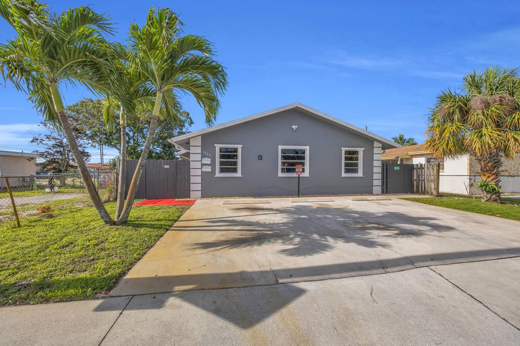 Photo of 1565 W 28th Street #A, Riviera Beach, FL 33404 (MLS # R11168403)