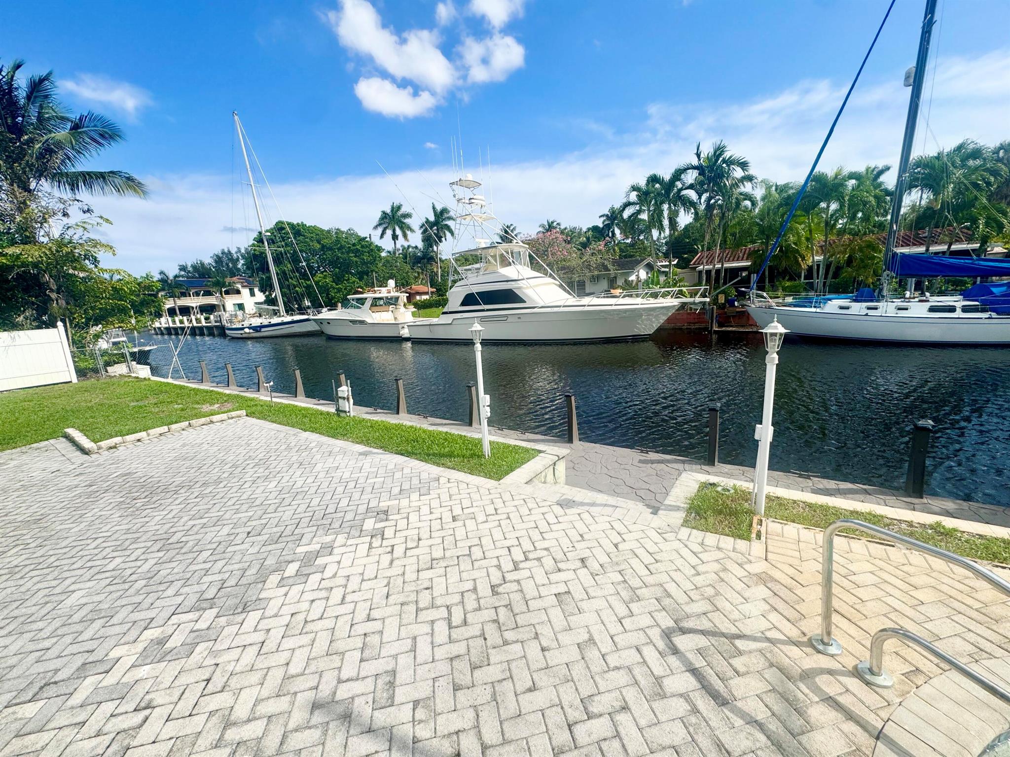 Dock Only Rental - 85' Boat dock available. NO FIXED BRIDGES to open ocean access. Up to 70 ft. vessel (max) can be accommodated. Minimum monthly rent is $1,250.00. Actual rent will be calculated based on total boat length ($40/ft). Features: 50-amp shore power connection, fresh water hookup, secure & well-lit, no fixed bridges (ocean access), safe no-wake zone, parking for up to 2 vehicles. Easy access to the ocean, downtown Fort Lauderdale, and Port Everglades. Water and electric included. Overnight or continuous electric use subject to additional charges. Restrictions on use: Access only between 6am to 10pm. 24-hour advance notice required to access property. No liveaboards, parties, loud music (while docked), loitering, or overnight stays.