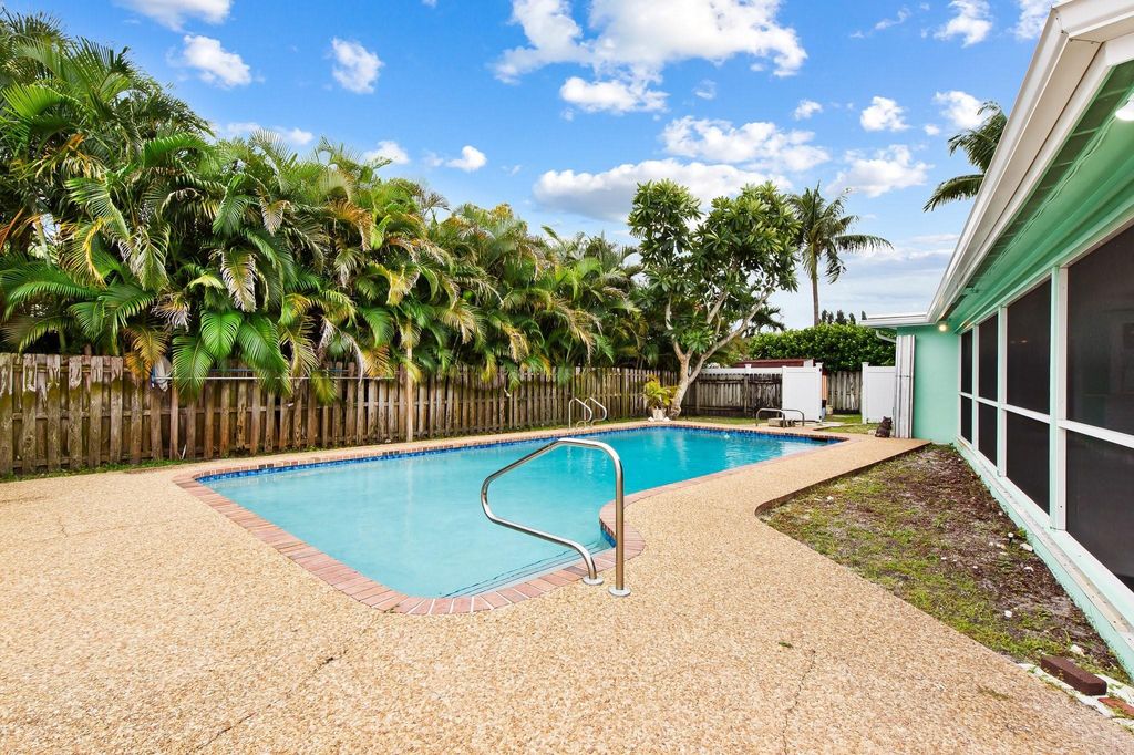 Photo of 1034 NW 6th Drive, Boca Raton, FL 33486 (MLS # F10467542)