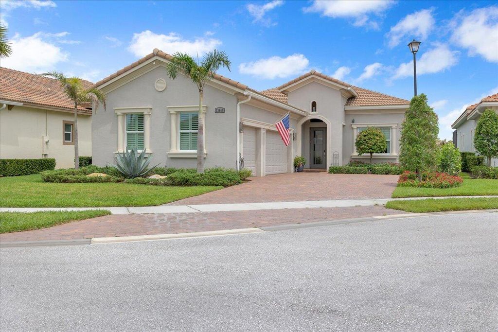 Photo of 23009 SW Accesi Way, Port Saint Lucie, FL 34986 (MLS # B26039993)