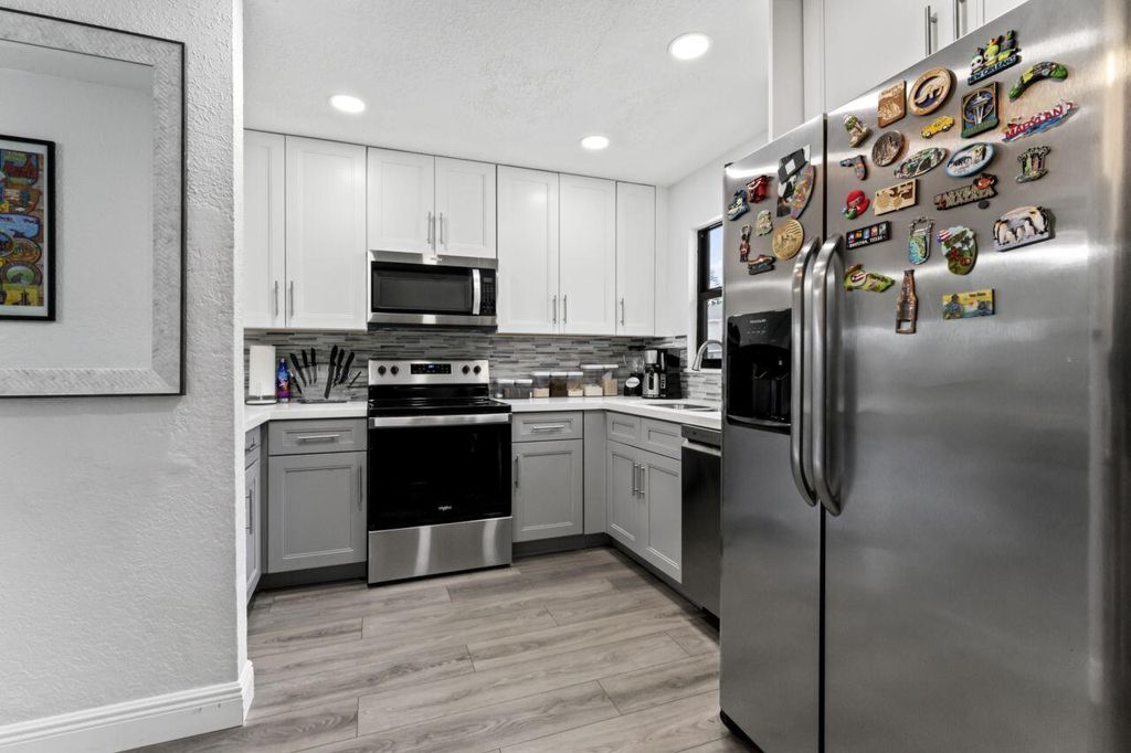 Photo of 5401 Bayside Drive, Greenacres, FL 33463 (MLS # R10993691)