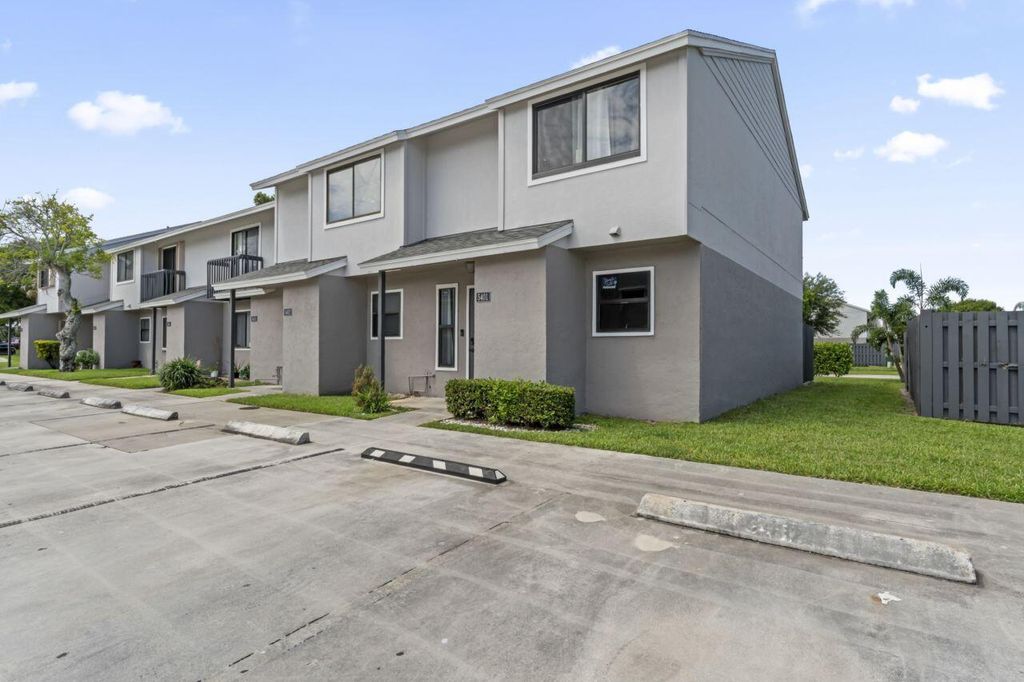 Photo of 5401 Bayside Drive, Greenacres, FL 33463 (MLS # R10993691)