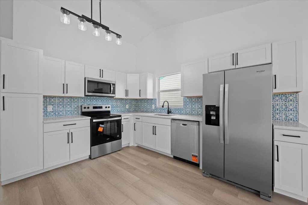 Photo of 5082 Dalewood Lane, Lake Worth, FL 33467 (MLS # B26040436)