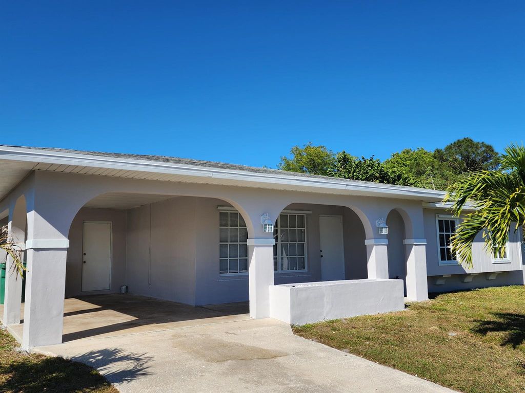 Photo of 249 NE Camelot Drive, Port Saint Lucie, FL 34983 (MLS # R10975880)