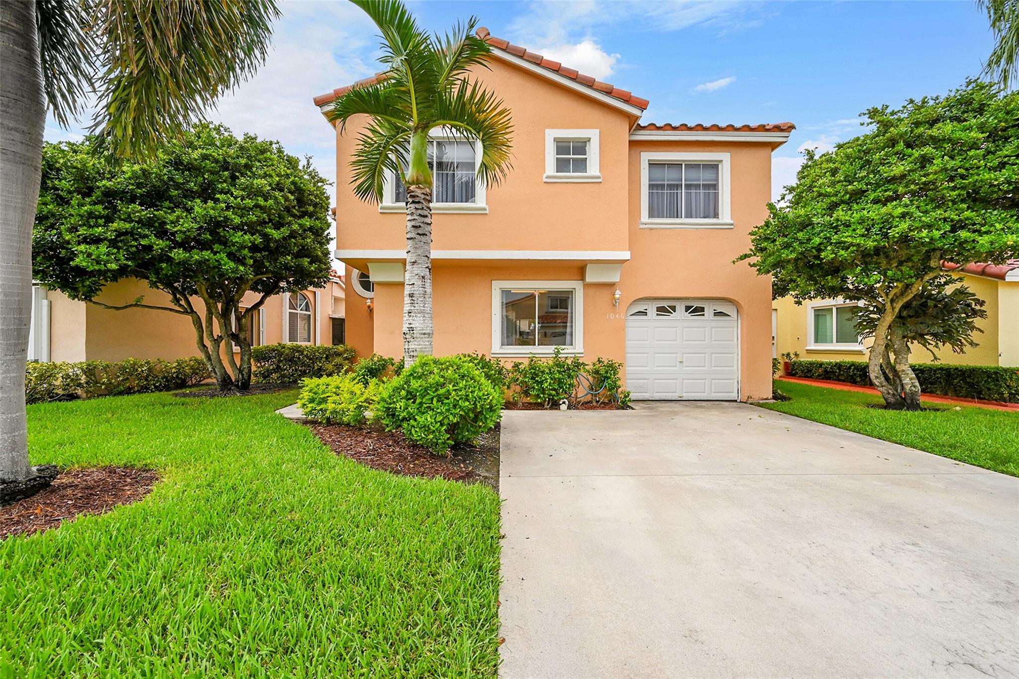 Location! Nestled less than a mile from Dania and Hollywood Beach, this charming 3-bedroom, 2 and a half bath home offers convenience, comfort, and lifestyle. For the past 25 years, this home has been lovingly cared for and maintained, and it’s now ready for its next chapter with a new owner. Step inside and discover a home filled with potential—a true blank canvas where you can add your own personal touches. Important updates: a new roof (2020), a storm-rated garage door (2020), and a 2016 A/C system. The primary bathroom has been tastefully updated with a walk in shower and double vanity. The screened-in patio overlooking the water extends your living space outdoors. Less than 15 minutes from Ft. Lauderdale Airport and walking distance to West Lake Park, the location is truly ideal!